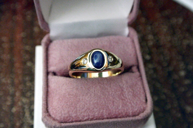 Picture of a Star Sapphire ring with 2 side diamonds